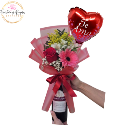 RAMO EN UNA BOTELLA DE VINO 750ML CON 1 ROSA, 1 GERBERA, FOLLAJE, ENVOLTURA Y GLOBO